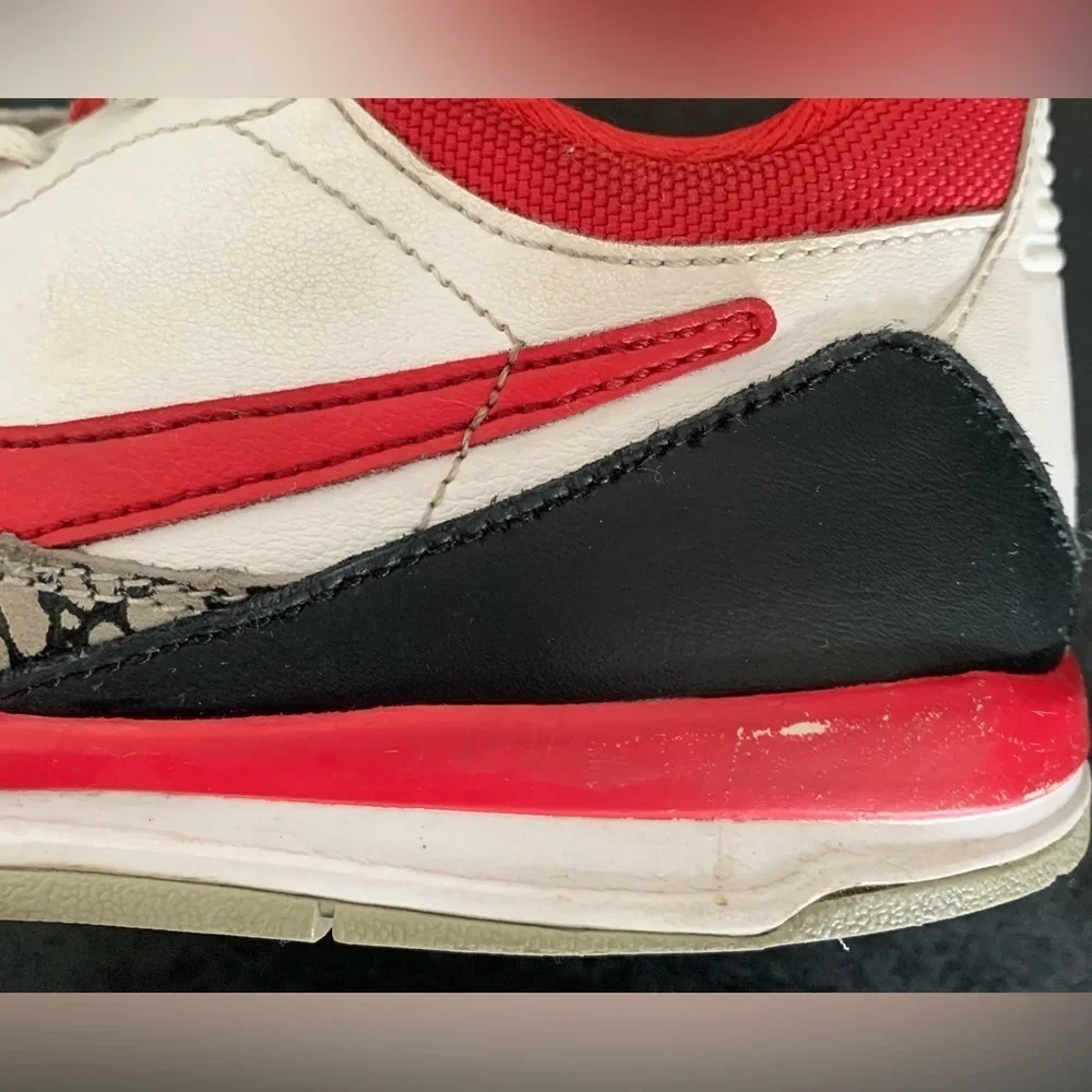 Nike Air Jordan Legacy 312 Low Fire White, Red, and Black Sneakers